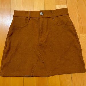 Super cute tanned/orange/brown skirt perfect for fall and winter!